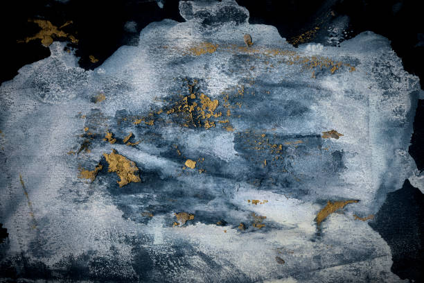 istock Grunge hand painted gold paint stroke texture background 1335370776