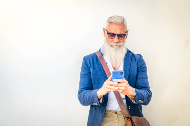 istock Senior man with a phone 1335372769
