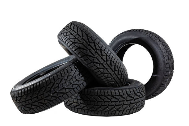 istock Four tires on the white background 1335379912