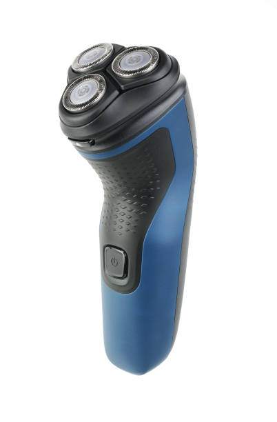 Electric shaver with three shaving heads isolated on white background.