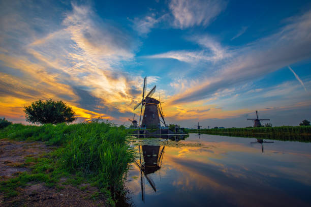 istock Sunset above historic windmills in Kinderdijk, Netherlands 1335388433