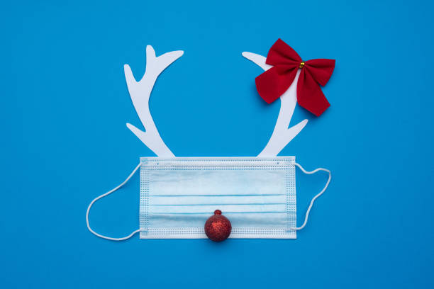 istock Festive christmas reindeer made from face mask and decorations 1335391717