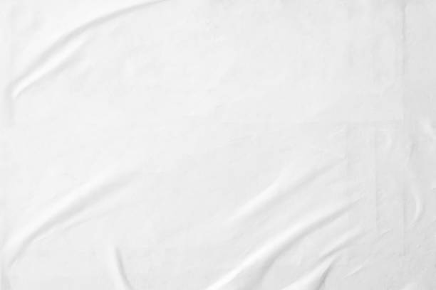 istock white crumpled and creased paper poster texture background 1335392547