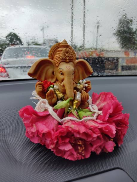 istock Ganapati Idol on Car Dashboard 1335392895