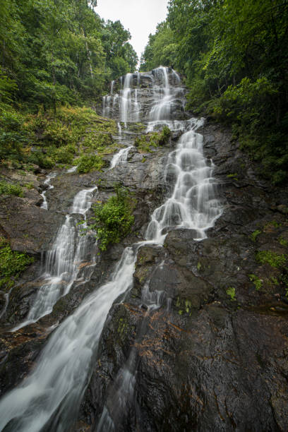Streaks of water flowing down and over jagged boulders at Amicalola Falls. Photo taken with Nikon D750 and Sigma 12-24mm zoom lens