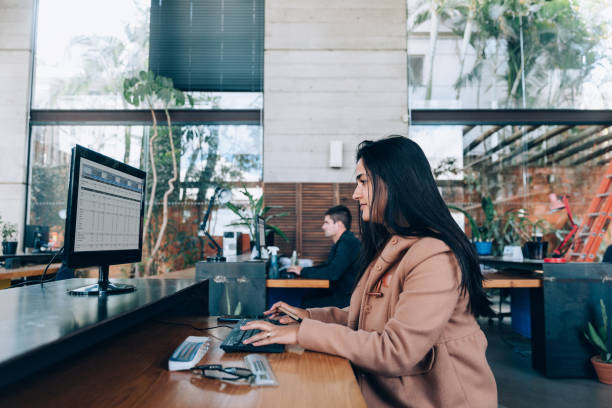 istock Coworkers at office 1335397037