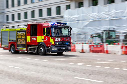 London, England, UK - August 19, 2021:  Fire truck driving straight at camera on a London city centre street