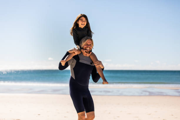 istock Aussie dad gives his daughter a shoulder ride 1335399764