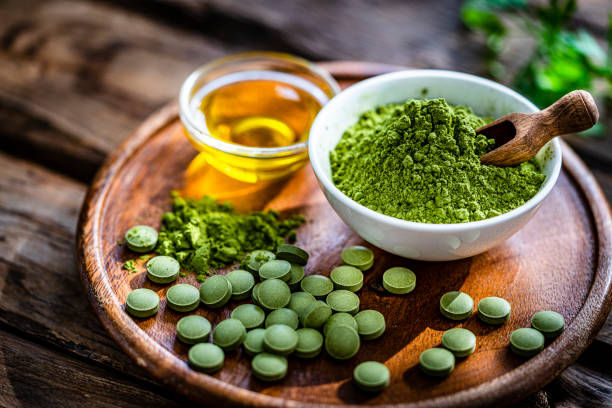istock Herbal medicine: Moringa oleifera powder and pills 1335399956
