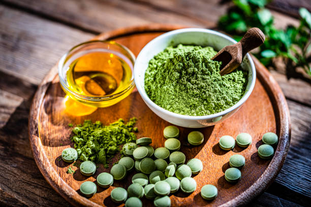 istock Alternative medicine: Moringa oleifera powder and pills 1335399986