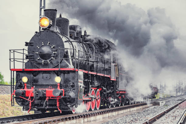 istock Retro freight train moves under the rain. 1335400823