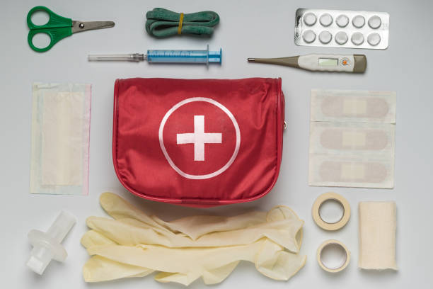 istock Medical supplies from a red first aid kit 1335402672
