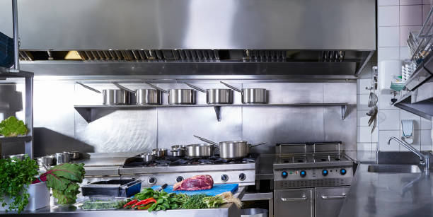 professional restaurant kitchen stainless steel - storkök bildbanksfoton och bilder