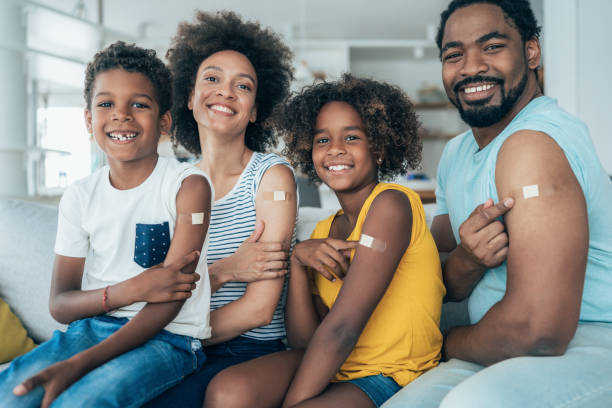istock Portrait of a vaccinated family 1335406301