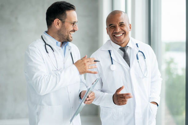 istock Two doctors talking at hospital 1335406304