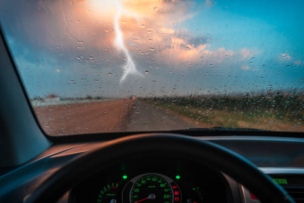 Raindrops on the windshield of the car