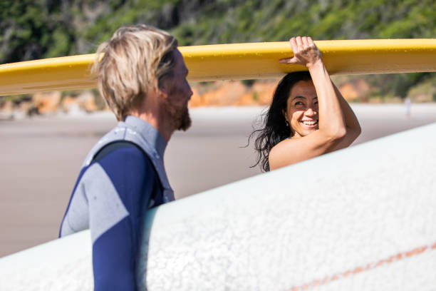 istock Couple that surfs together stays together 1335407699