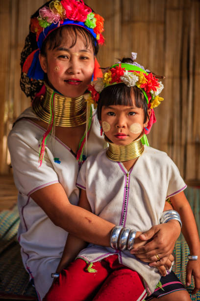 Portrait of Woman from Long Neck Karen Tribe Portrait of a long-neck woman Padaung (Karen) tribe, Mae Hong Son Province in Northern Thailand. padaung tribe stock pictures, royalty-free photos & images