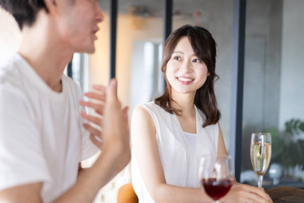 istock Couple drinking alcohol at a bar 1335414243