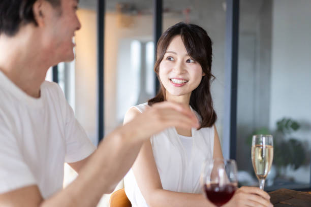 istock Couple drinking alcohol at a bar 1335414248