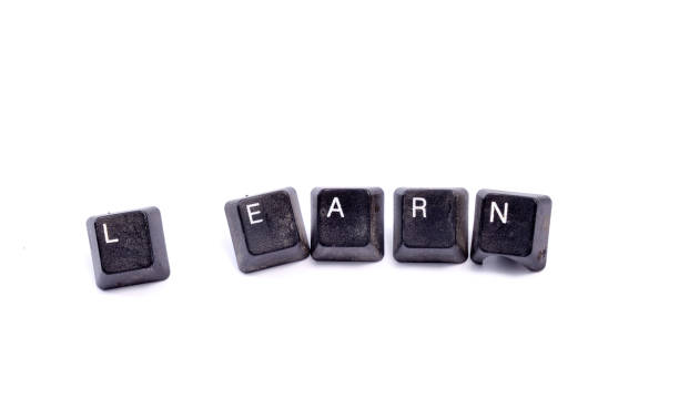 istock Word writing text Learn. Business concept. Dirty used eyboard buttons on white background. 1335416509