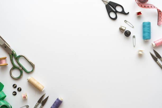 istock Flat lay composition with scissors and other sewing accessories on white background. Space for text 1335420480