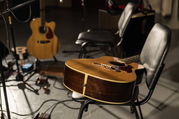 istock musical instruments on stage without musicians. concert cancellation empty stage 1335426525