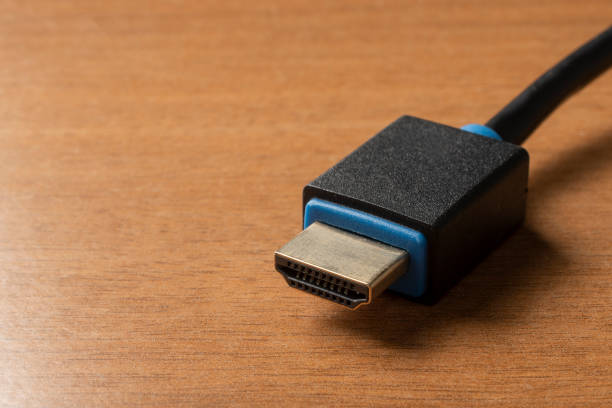 istock Hdmi (high definition multimedia interface) cable on wooden table 1335427977