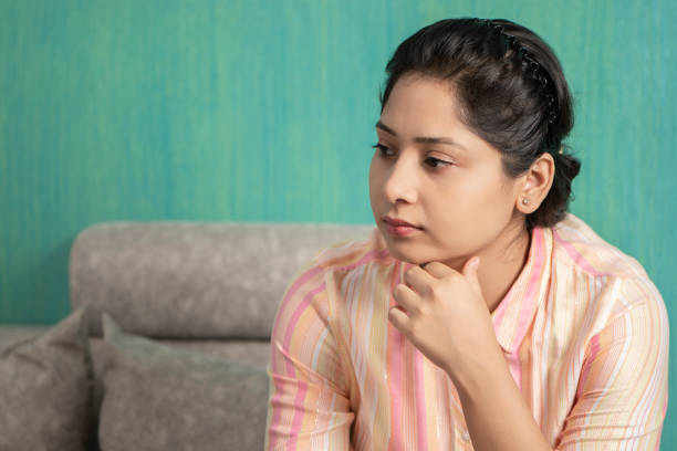 istock Young Asian Indian Mother at home with light makeup posing 1335428598