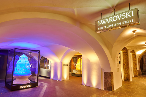 Innsbruck, Austria - August 06, 2021: a large piece of Swarosvki glass on display outside the Swarovski Crystal Worls Innsbruck Store in Herzog-Friedrich-Strasse.