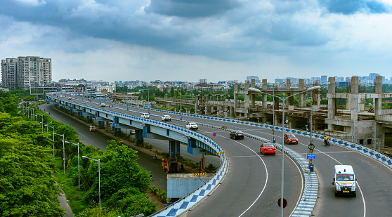 Kolkata, India, July 18,2021:Aerial view of MAA or PARAMA ISLAND Flyover with City scape View. Selective Focus is used.