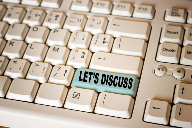 istock let's discuss on keyboard. Concept meaning Permit to Talk Open Up Go Over a Topic Chat Sharing 1335431598