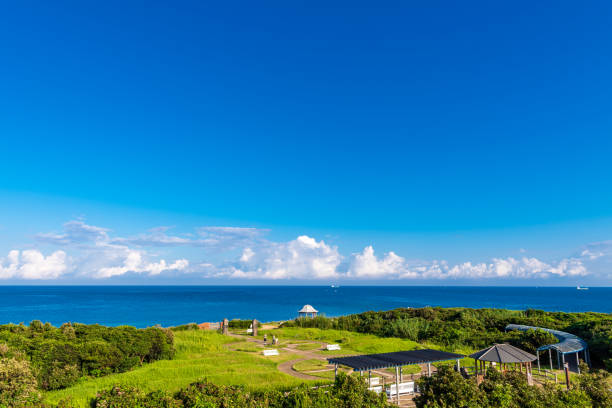 istock Tsunoshima Lighthouse Park with blue sky and beautiful sea in summer 1335433043