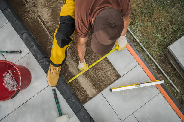 istock Small Architecture Worker Paving Residential Patio Area 1335434432