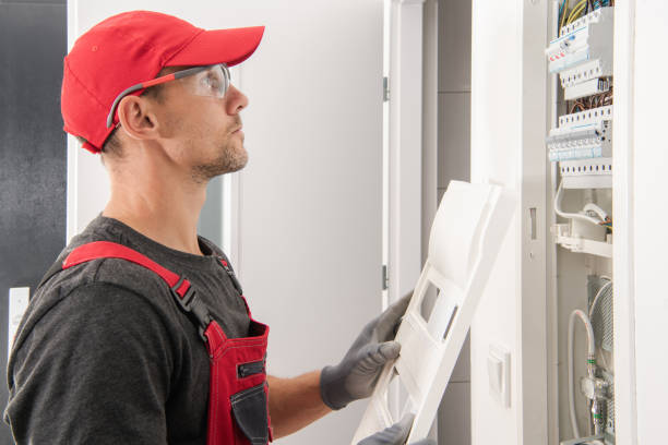 istock Professional Electrician Checking Fuse Boxes 1335434740