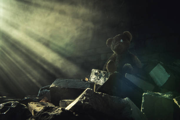 istock Aged Teddy Bear Inside Abandoned House Ruins Brighten Up by Sun Rays 1335435183