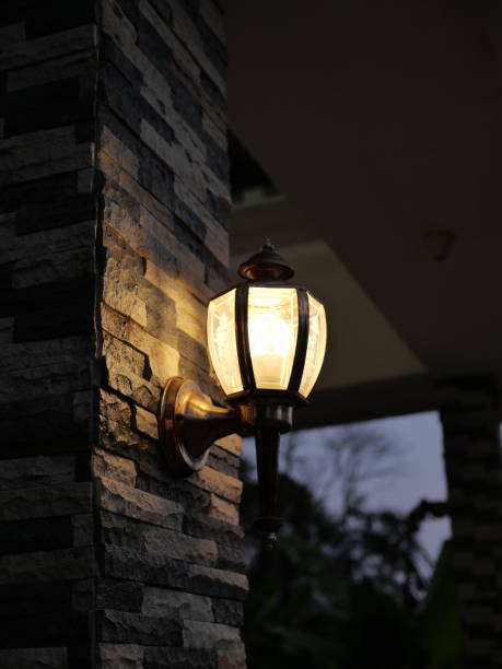 istock A lamp that has a unique shape lights up in front of the house 1335437672