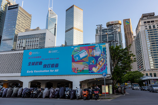 Hong Kong - August 20, 2021 : Government advertising the COVID-19 Vaccination Programme in Central, Hong Kong.