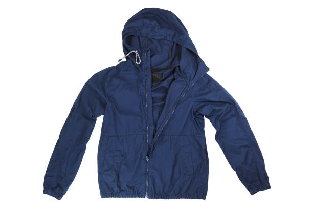 istock Jacket isolated on white background.Mens blue jacket in a hood isolated on a white background. Windbreaker jacket. Casual style. 1335439917