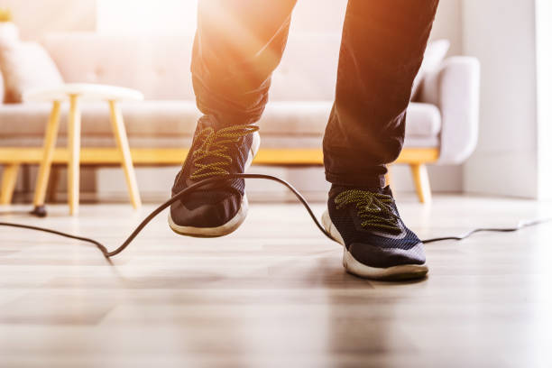 istock Stumble Over Cable. Clumsy Office Falldown 1335440084