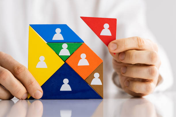 istock HR Recruitment Hand Making Tangram Puzzle 1335442963