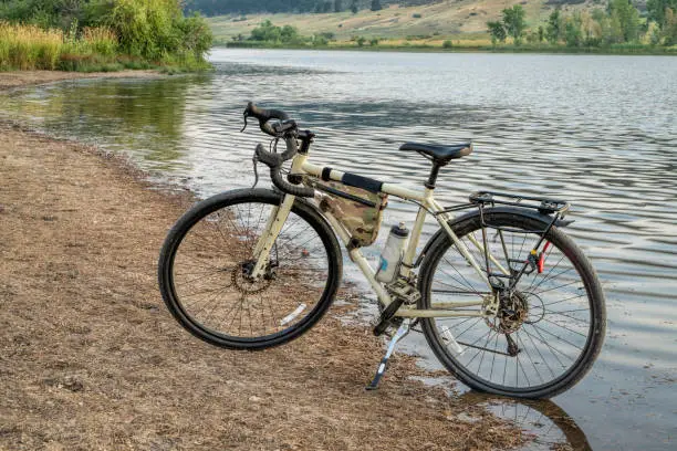 touring or gravel bicycle on lake shore at Colorado foothills, summer scenery