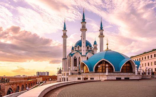 Kazan Kremlin in summer, Tatarstan, Russia. Beautiful view of Kul Sharif mosque, landmark of Kazan. Modern architecture, tourist attraction in Kazan city center at sunset. Islam and travel concept.