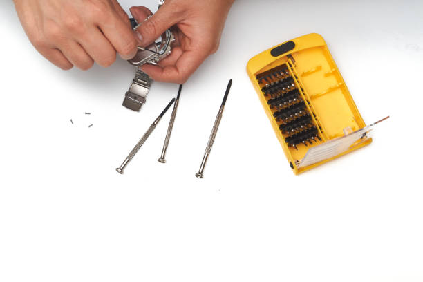 istock watchmaker uncovering a watch 1335453143