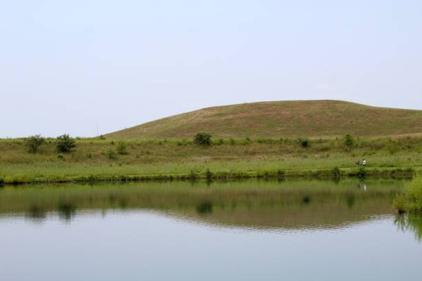 istock Lake and Hill Landscape 1335457529