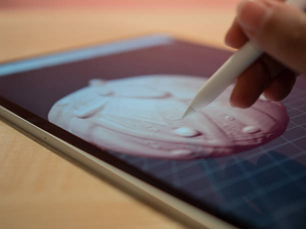 istock 3D modeling in a mobile application, the author's hand creates a model 1335466834