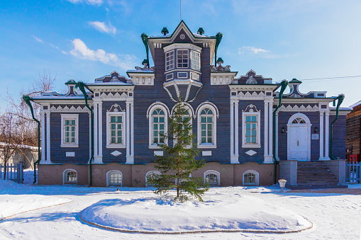Irkutsk, Russia - February 23, 2021: House-Museum of the Trubetskoys - a branch of the Irkutsk Museum of the Decembrists on a sunny winter day. Irkutsk, Dzerzhinsky street, 64