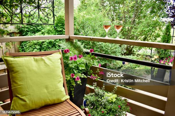 Outdoor Oasis Setting On Secluded Deck For Relaxation On Summer Vacation Rental Rustic Luxury Villa Cabin With View Stock Photo - Download Image Now