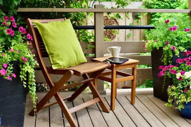 istock Relaxing seasonal backyard oasis for working from home, available with remote connectivity. 1335475644