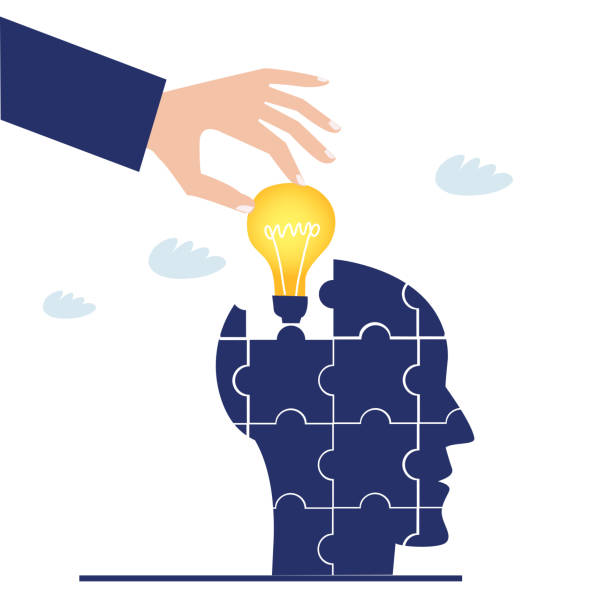 istock Human head made of puzzle pieces, Business concept illustration 1335476629